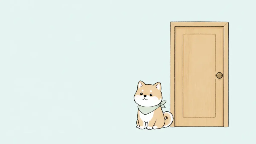 扉のこちら側に座る豆柴